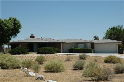 15063 Miami Road Apple Valley, CA 92307 - Photo 1 of 1 a view of house with a yard