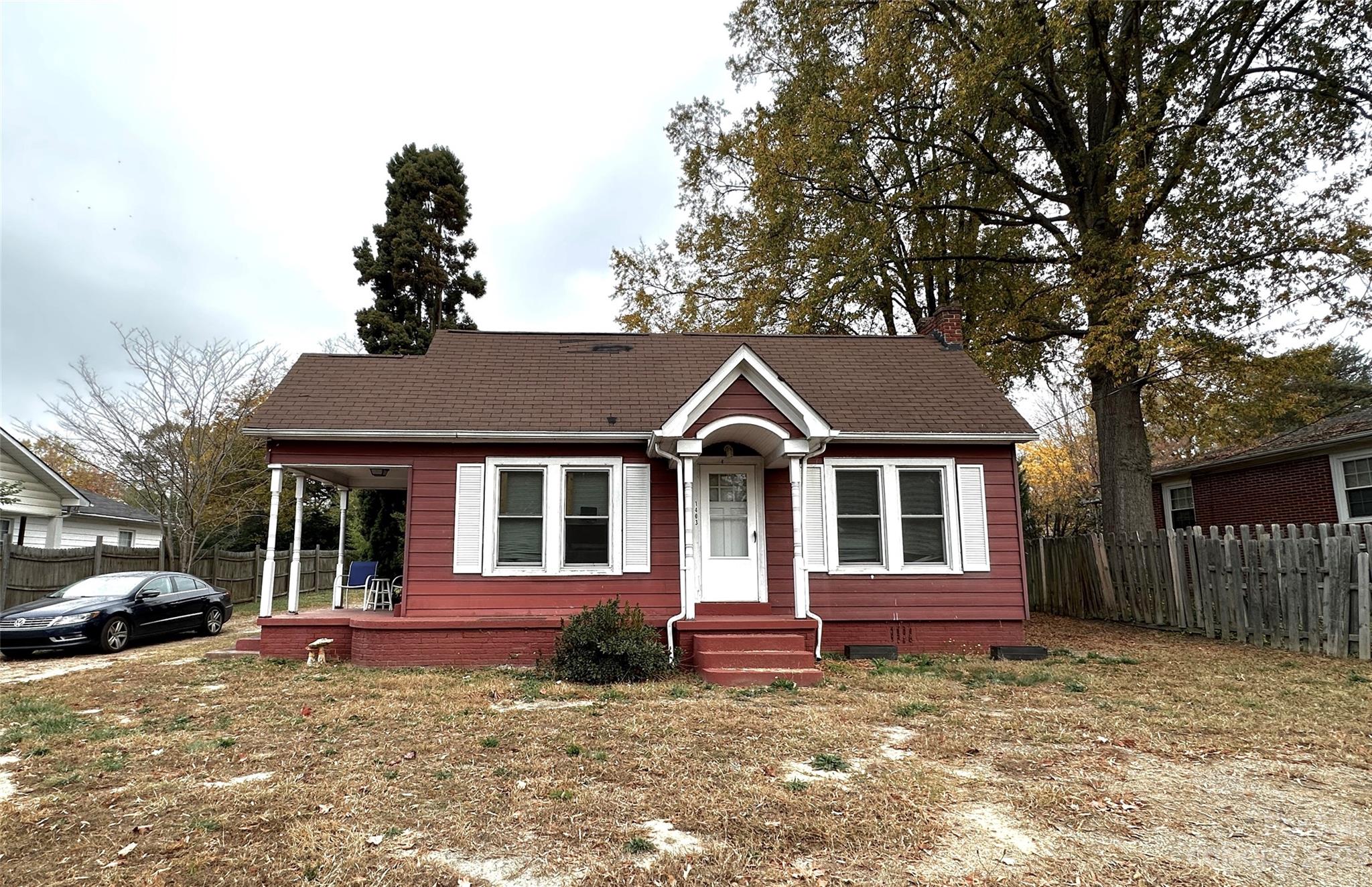 1403 Ln Street Kannapolis, NC 28083 - Photo 1 of 20 a front view of a house with a yard