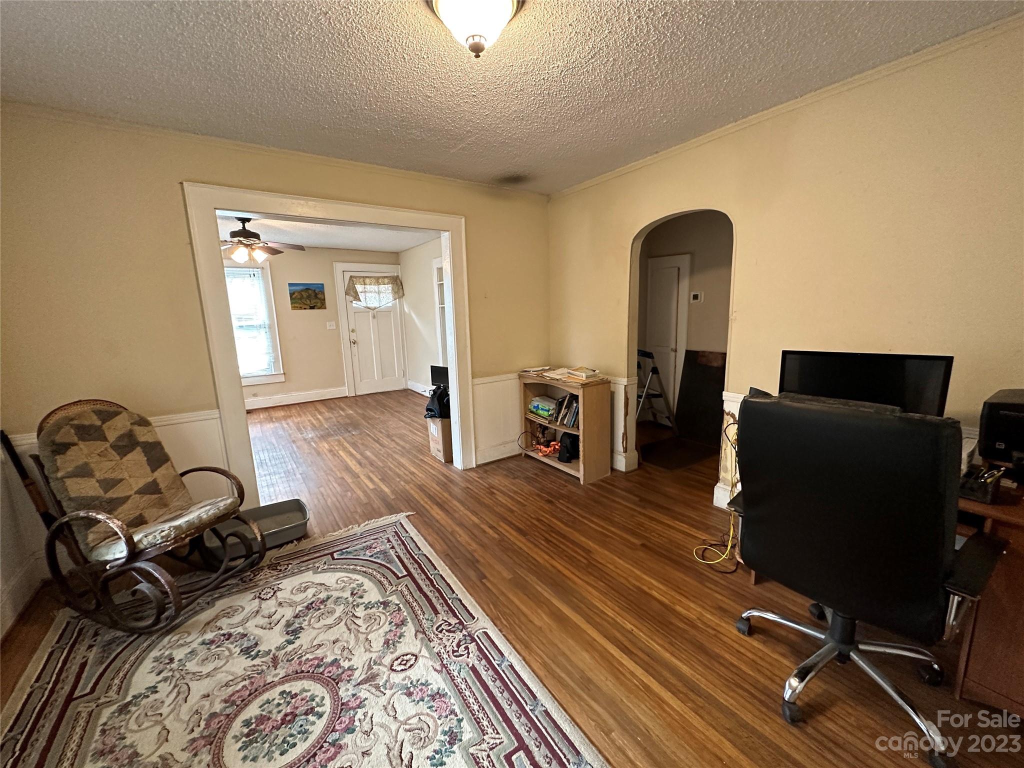 1403 Ln Street Kannapolis, NC 28083 - Photo 12 of 20 a view of a livingroom with furniture and wooden floor