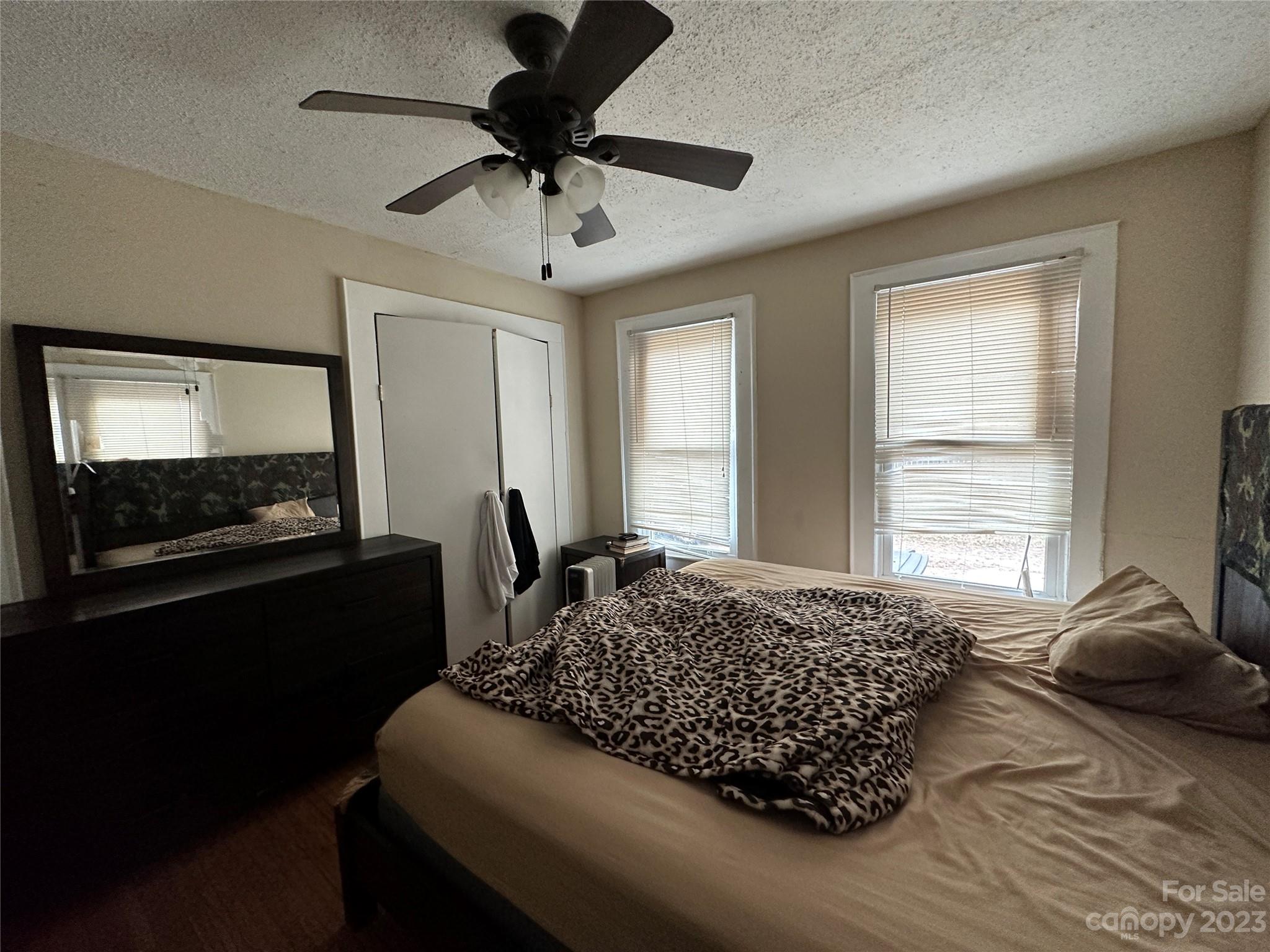 1403 Ln Street Kannapolis, NC 28083 - Photo 17 of 20 a bedroom with bed tv and window
