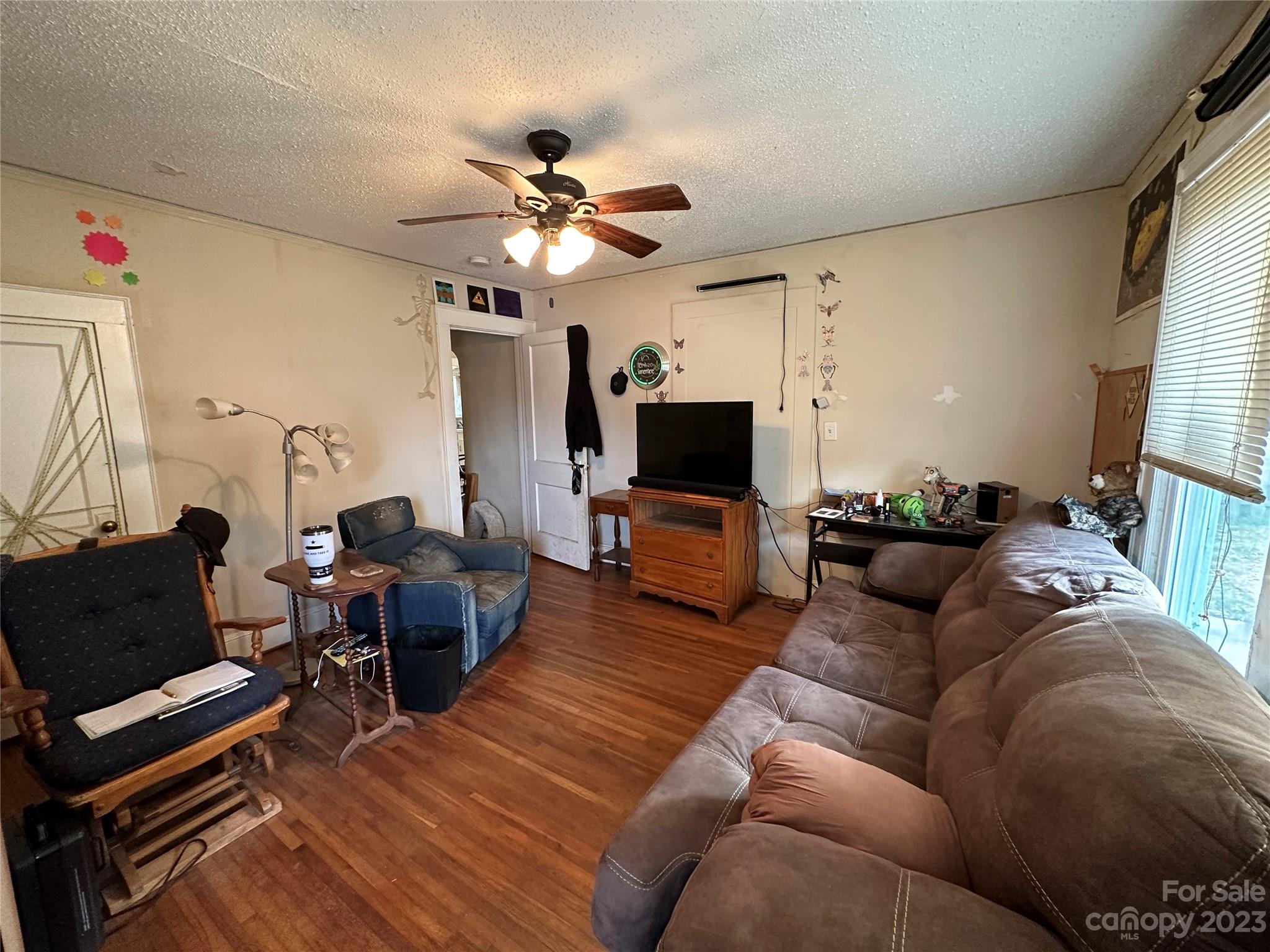 1403 Ln Street Kannapolis, NC 28083 - Photo 19 of 20 a living room with furniture and a flat screen tv