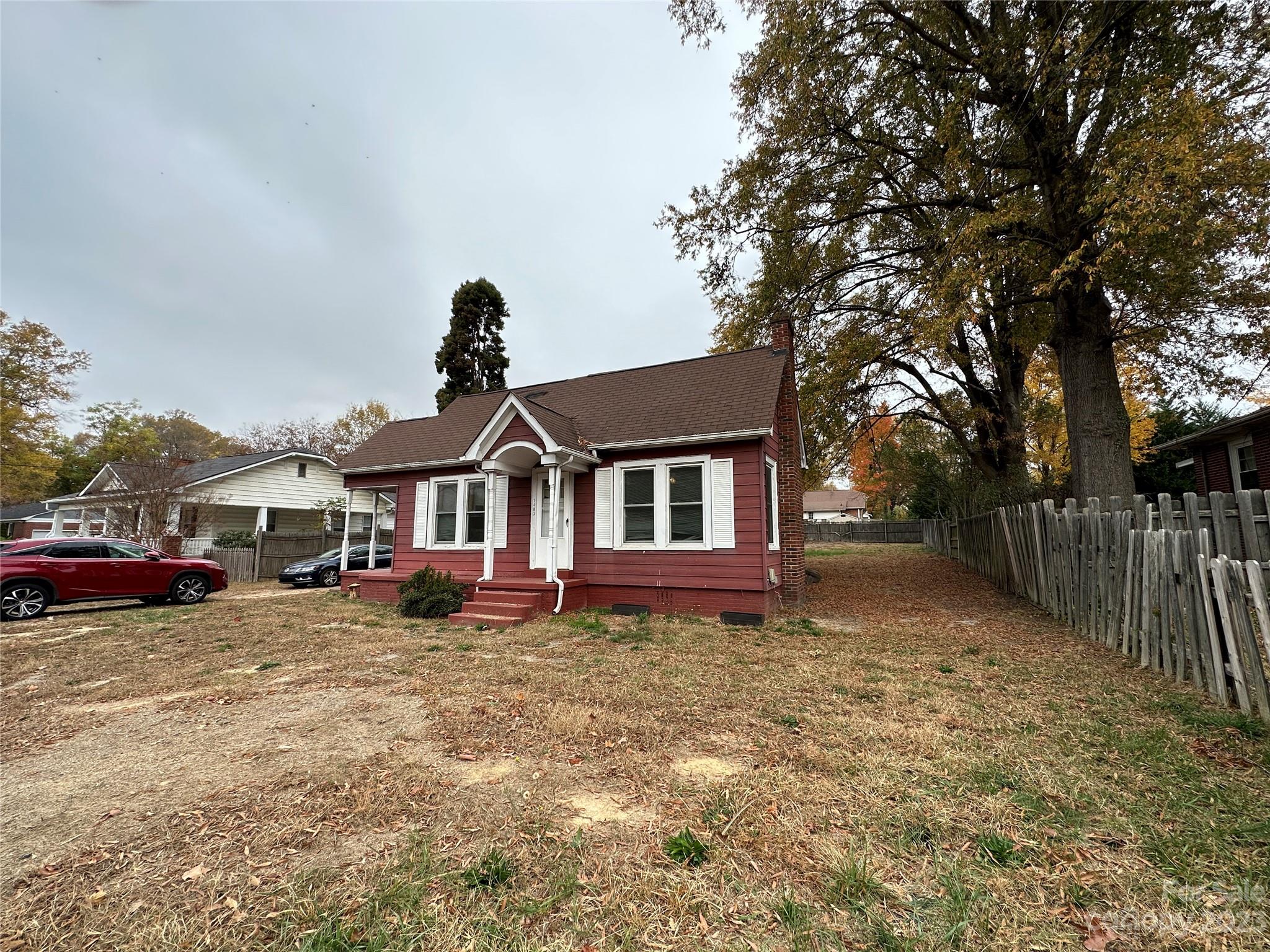 1403 Ln Street Kannapolis, NC 28083 - Photo 2 of 20 a view of a house with a yard