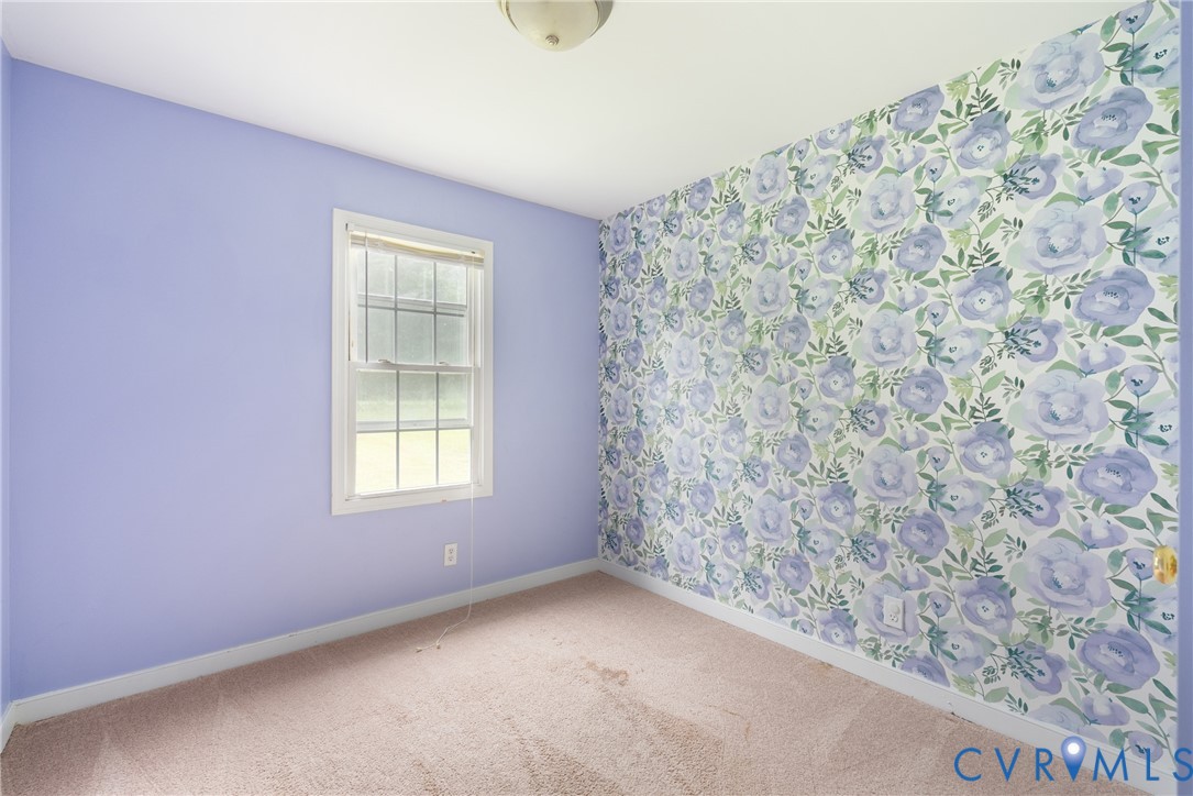 20786 Beaver Dam Road Beaverdam, VA 23015 - Photo 11 of 23 Carpeted spare room featuring baseboards and wallp