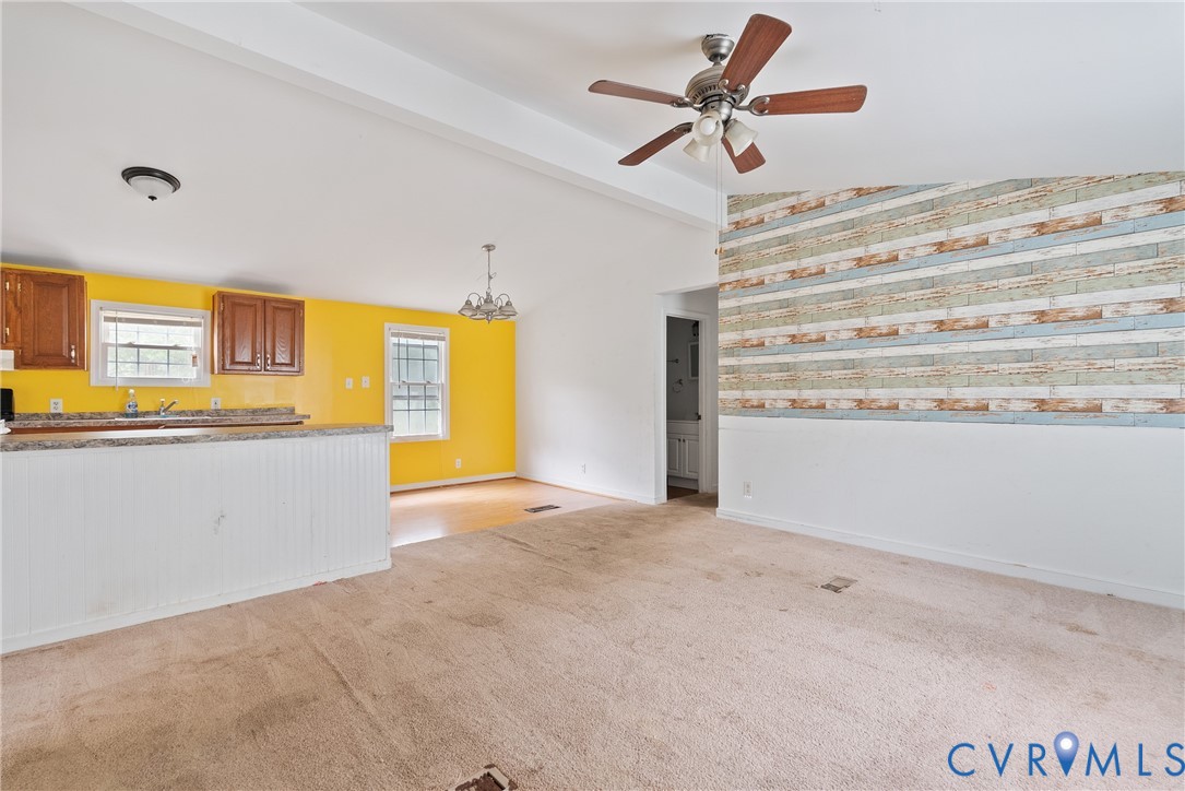 20786 Beaver Dam Road Beaverdam, VA 23015 - Photo 21 of 23 Unfurnished living room with vaulted ceiling, a ch