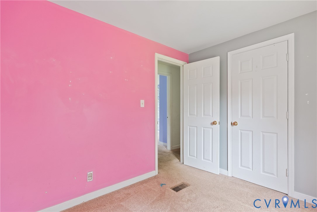 Unfurnished bedroom featuring carpet flooring and