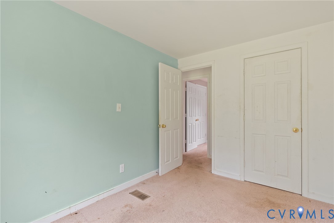 20786 Beaver Dam Road Beaverdam, VA 23015 - Photo 8 of 23 Unfurnished bedroom with carpet and baseboards