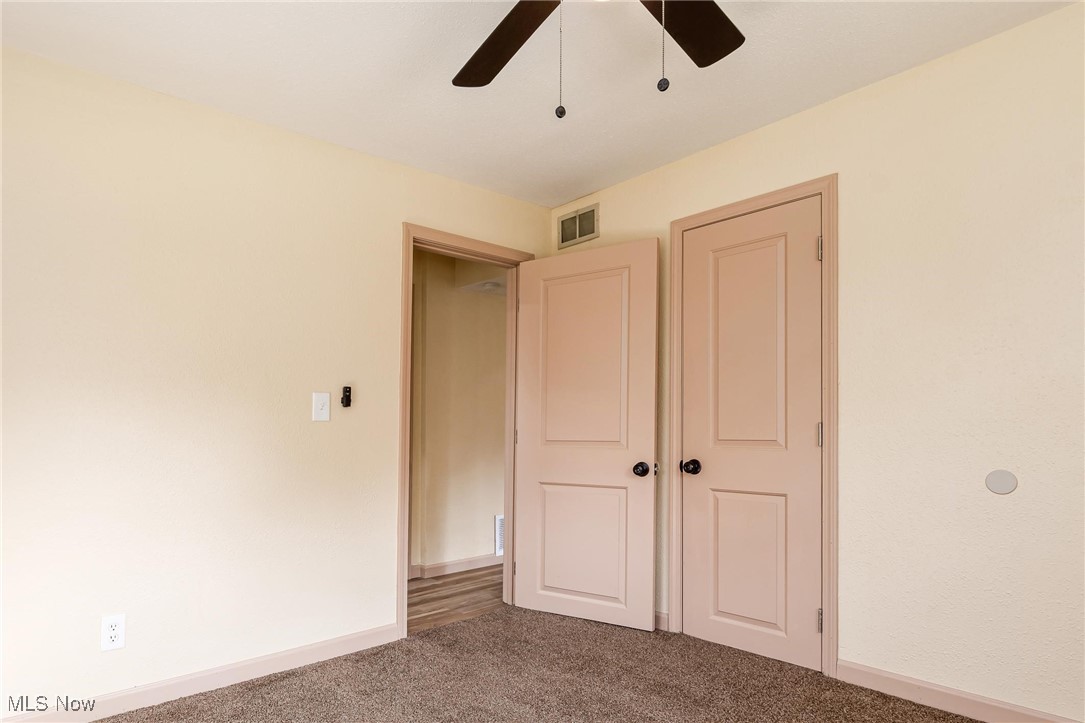724 Garden Road Zanesville, OH 43701 - Photo 13 of 22 Unfurnished bedroom with carpet floors and a ceiling fan