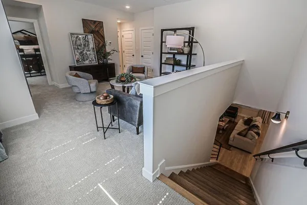 a room with furniture and white walls