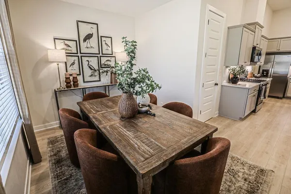 a view of a dining room with furniture