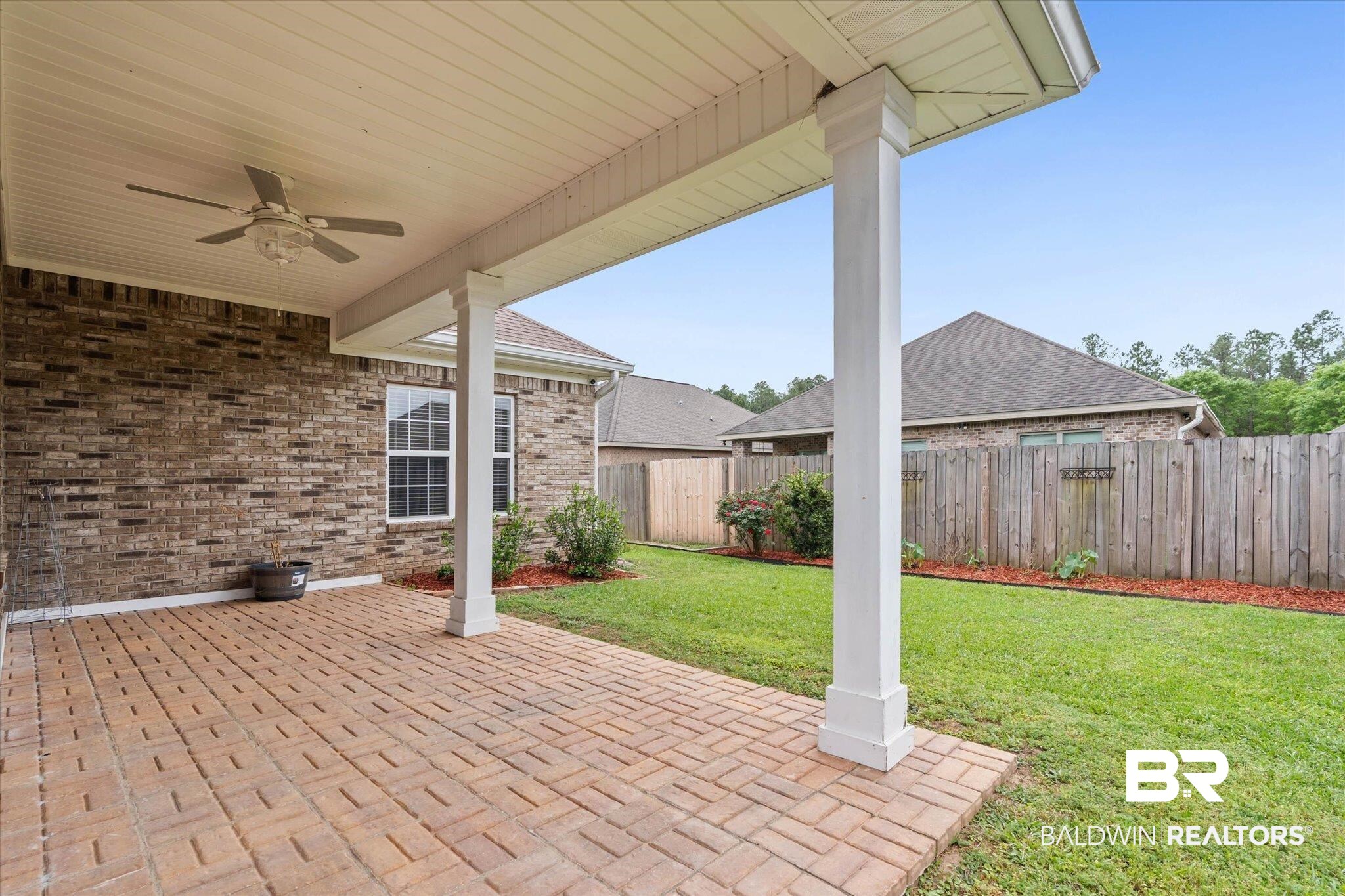 1003 Weatherby Street South Saraland, AL 36571 - Photo 28 of 31 Fenced backyard featuring a ceiling fan and a patio