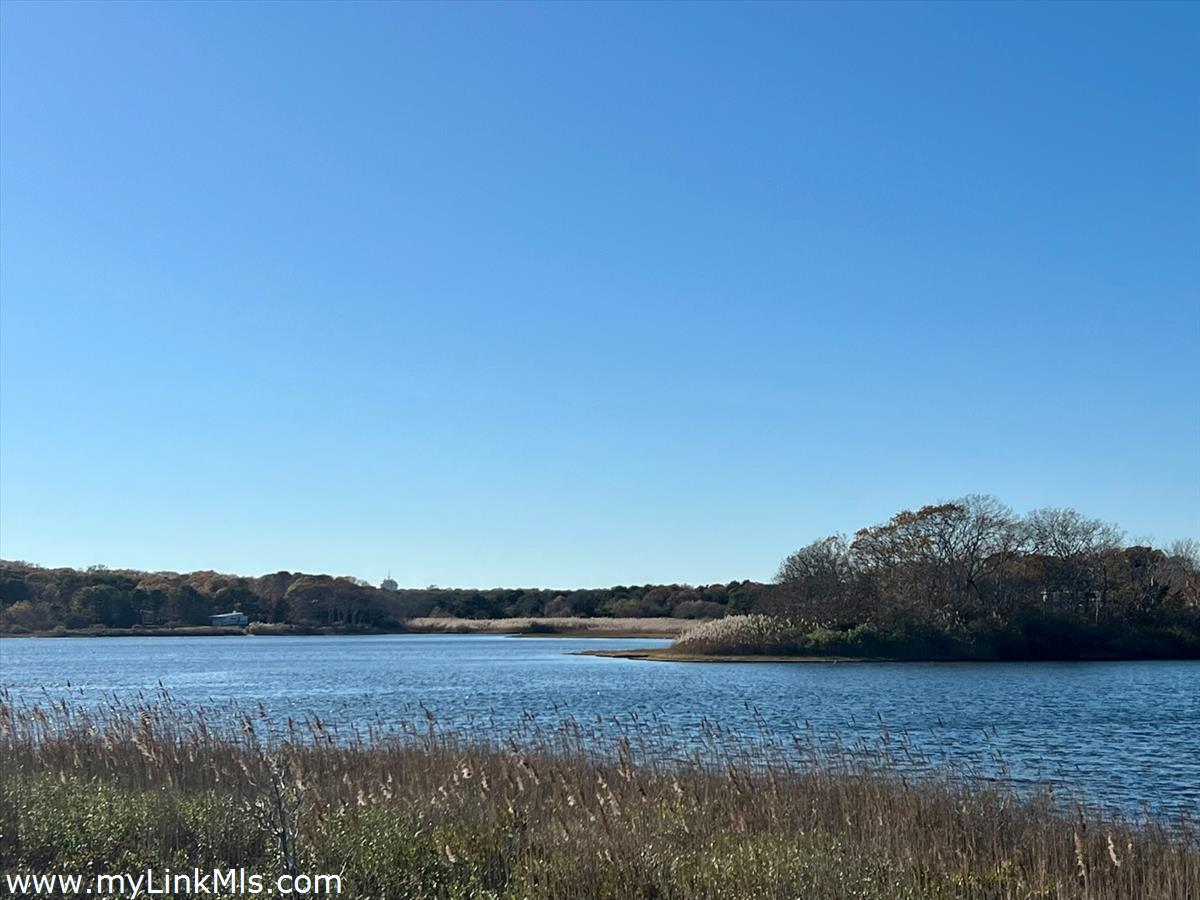 53 Harthaven Road Oak Bluffs, MA 02557 - Photo 4 of 9 a view of an ocean and mountain