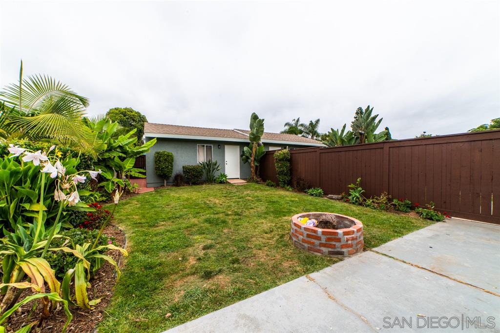 1095 Regal Road Encinitas, CA 92024 - Photo 20 of 21 a front view of a house with garden