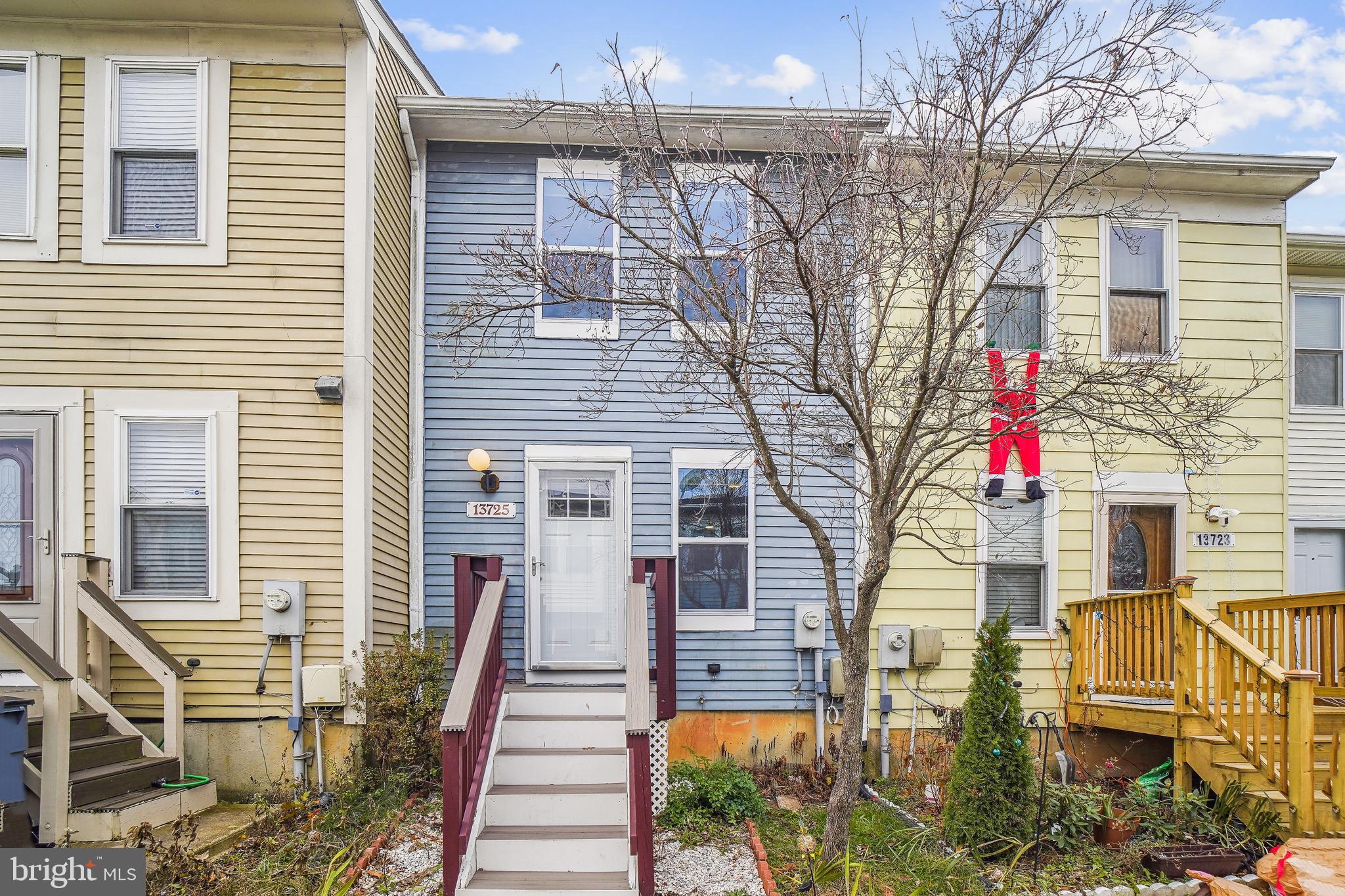 13725 Avonshire Drive Silver Spring, MD 20904 - Photo 2 of 26 a front view of a house with a yard