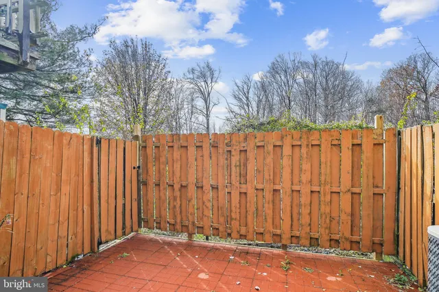 a view of a covered with wooden fence