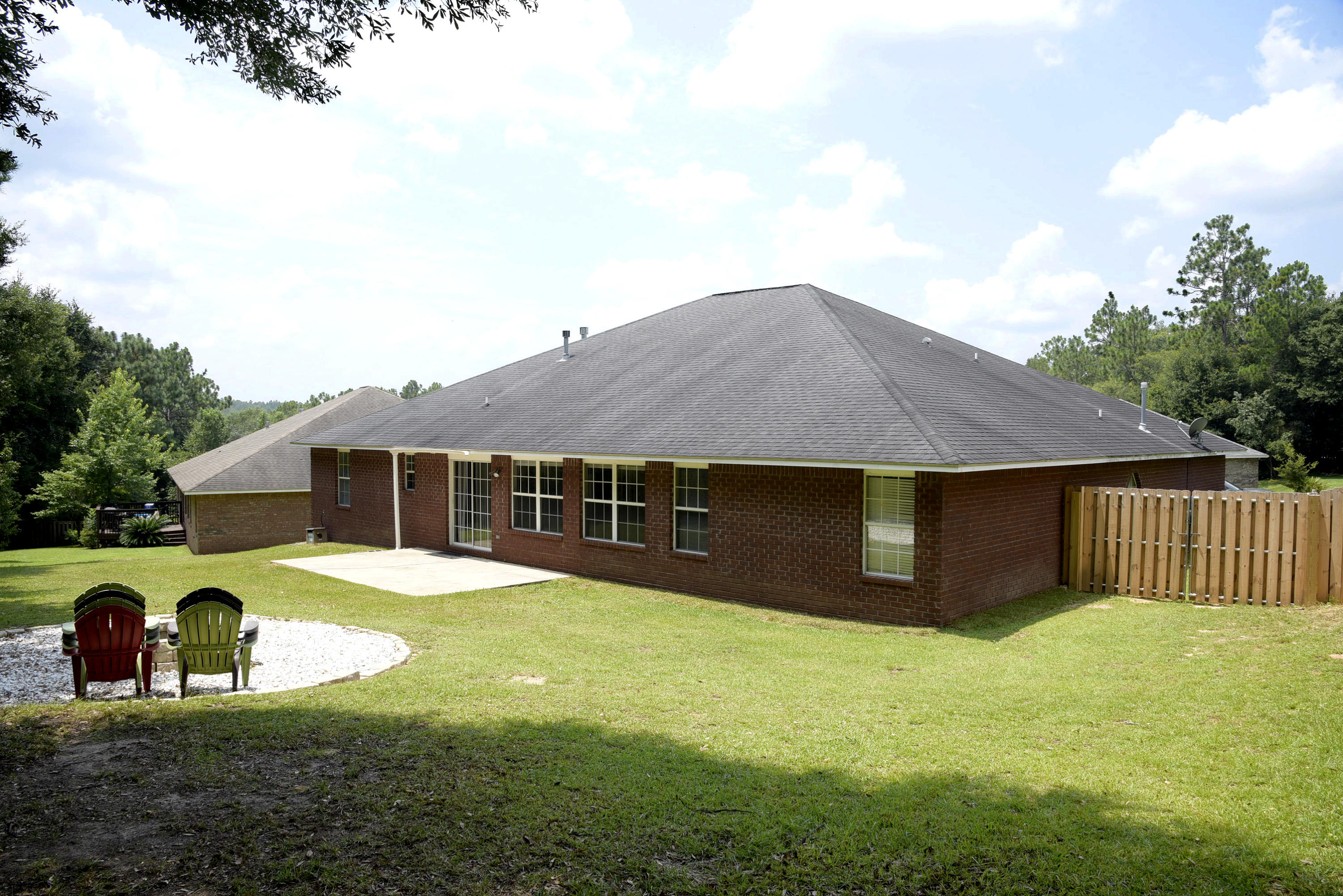 658 Territory Lane Crestview, FL 32536 - Photo 13 of 40 a house view with a garden space