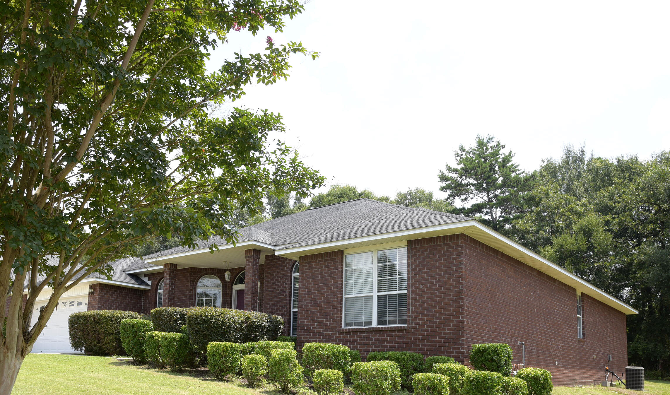 658 Territory Lane Crestview, FL 32536 - Photo 17 of 40 a view of a house with a yard