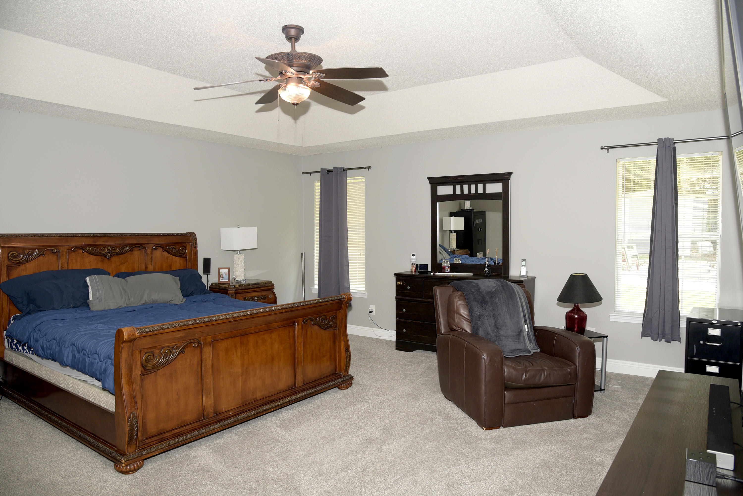 658 Territory Lane Crestview, FL 32536 - Photo 22 of 40 a bedroom with a bed couch and a window