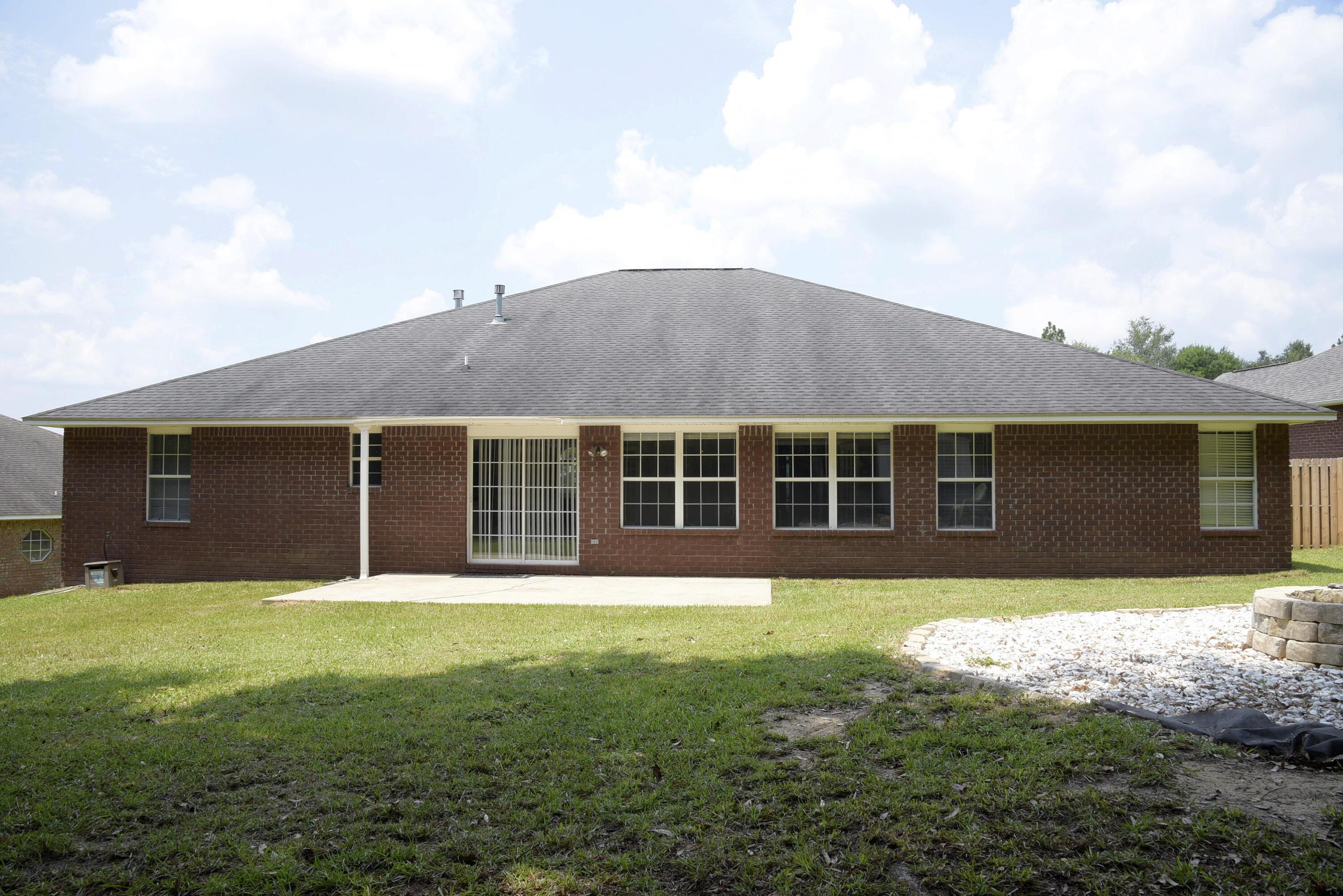658 Territory Lane Crestview, FL 32536 - Photo 27 of 40 a front view of house with yard and green space