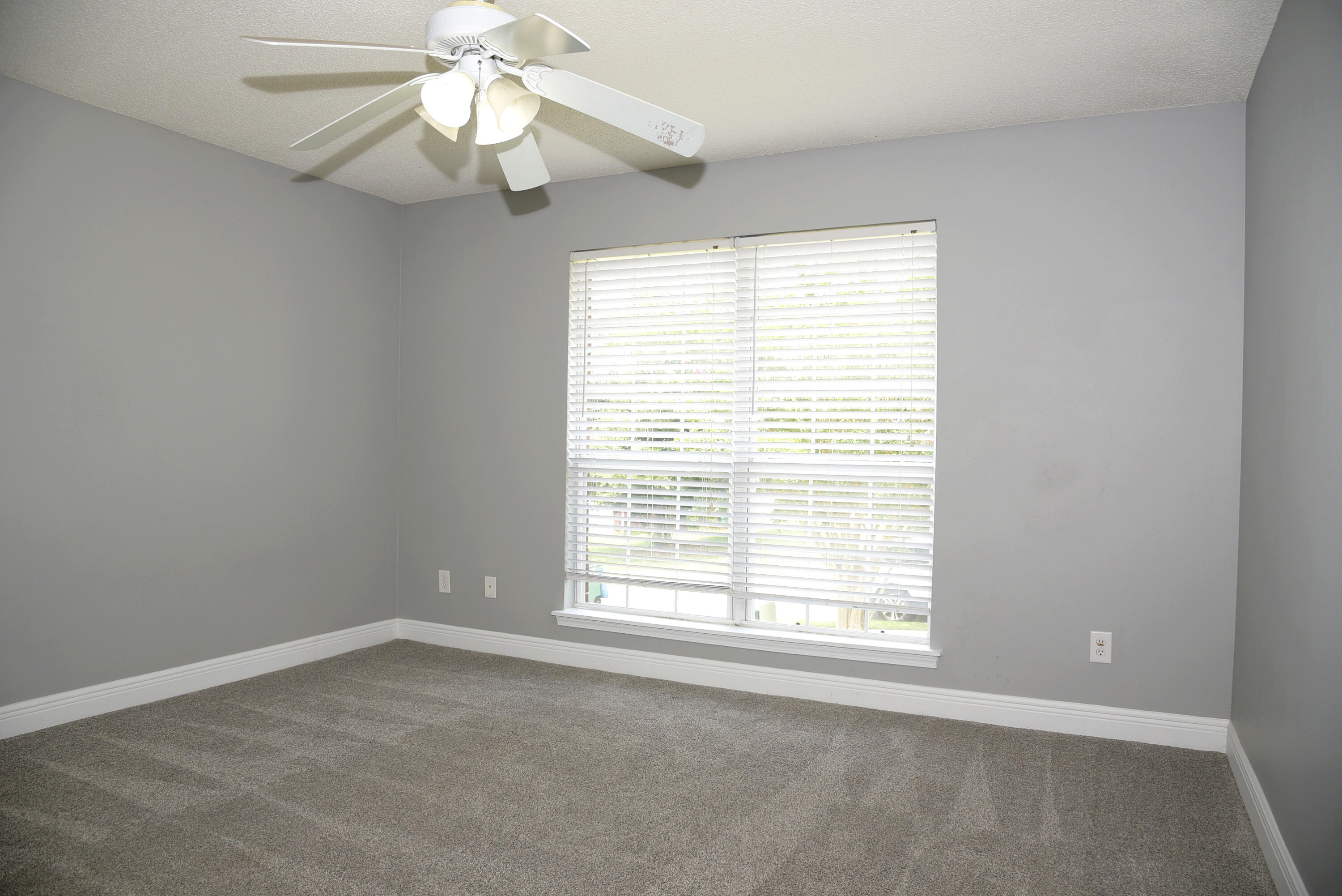 658 Territory Lane Crestview, FL 32536 - Photo 28 of 40 a view of an empty room with a window