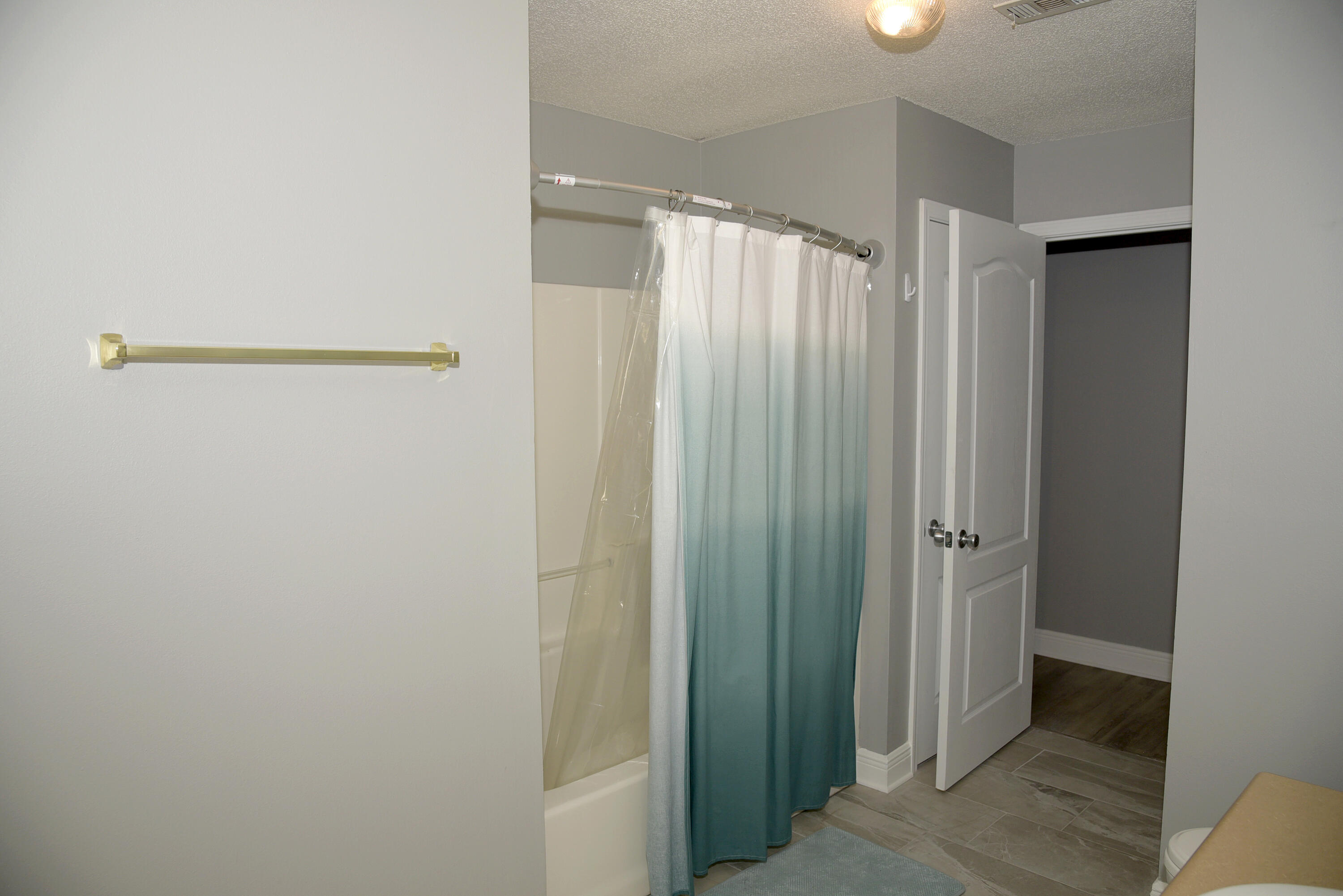 658 Territory Lane Crestview, FL 32536 - Photo 33 of 40 a bathroom with a shower and a mirror