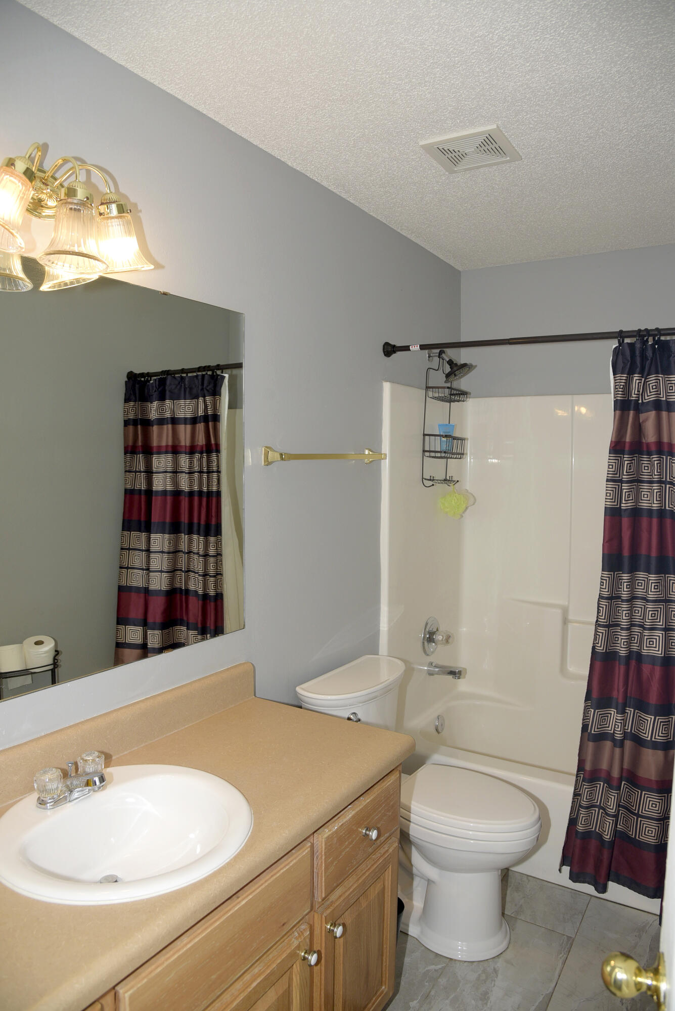 658 Territory Lane Crestview, FL 32536 - Photo 34 of 40 a bathroom with a sink toilet and shower