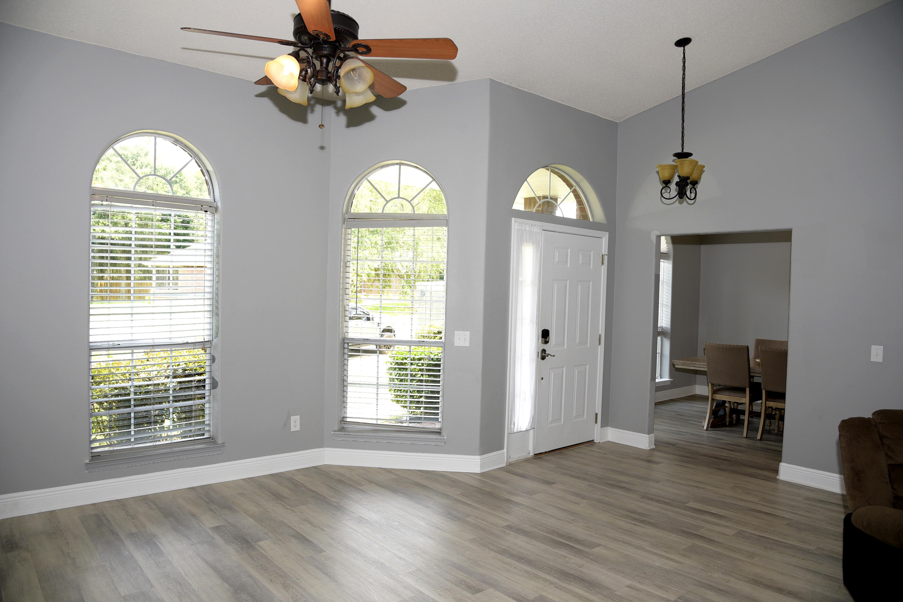658 Territory Lane Crestview, FL 32536 - Photo 37 of 40 a view of empty room with wooden floor and fan
