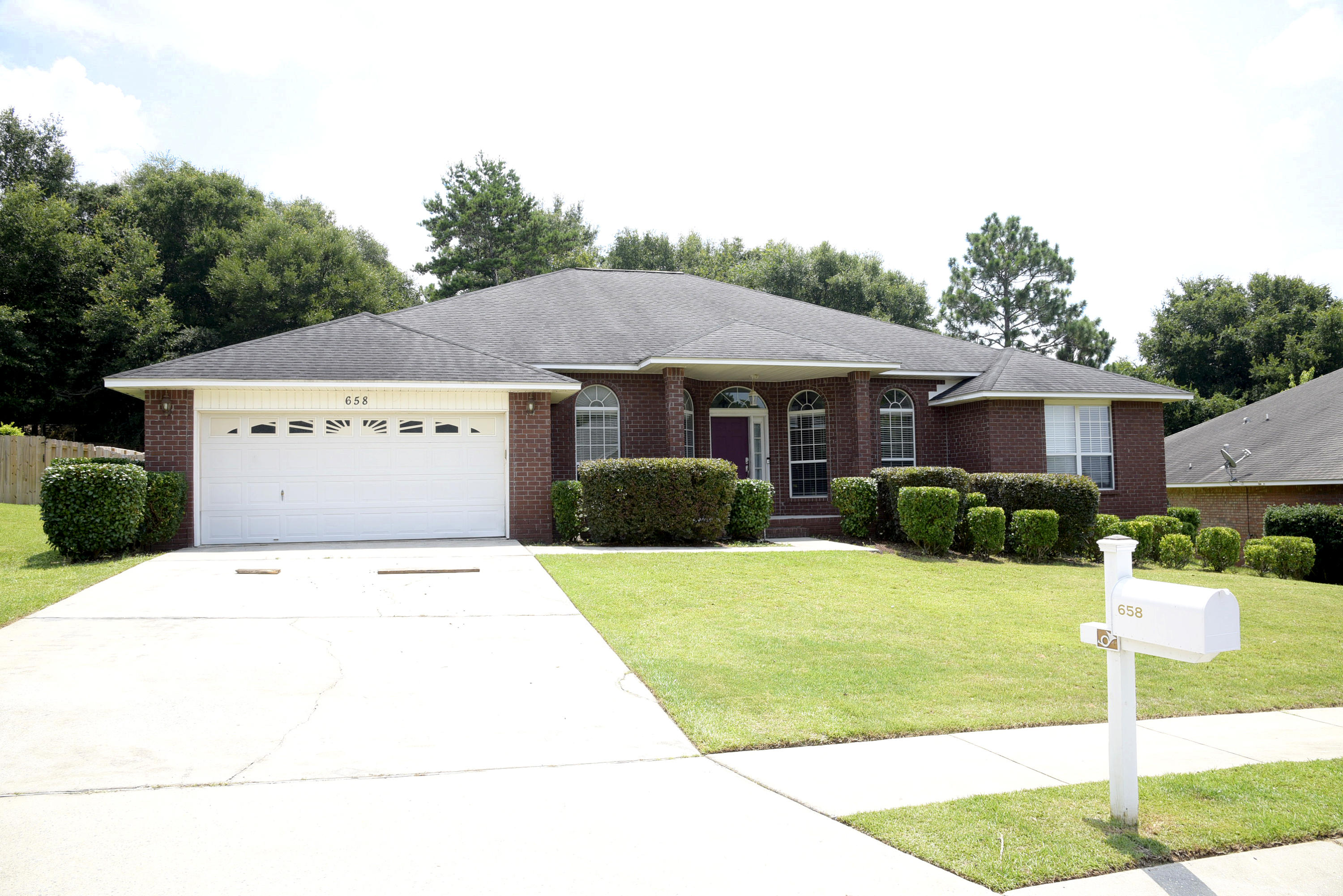 658 Territory Lane Crestview, FL 32536 - Photo 39 of 40 a front view of a house with a yard