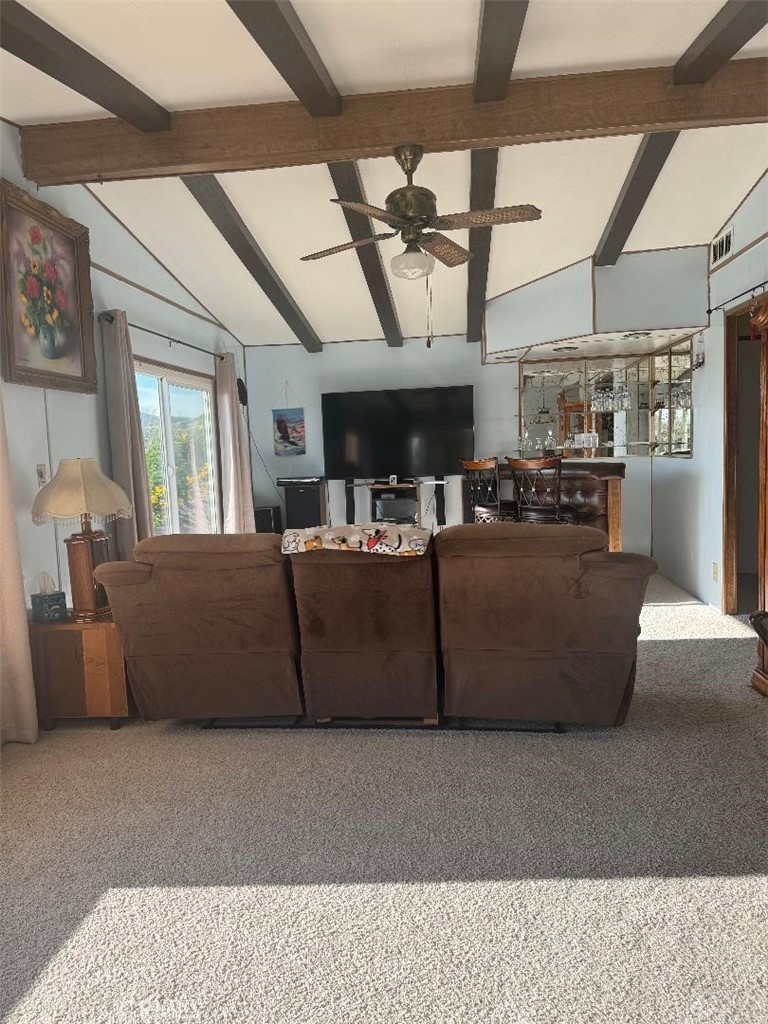41004 Cheyenne Trail Cherry Valley, CA 92223 - Photo 4 of 10 a living room with furniture and a chandelier