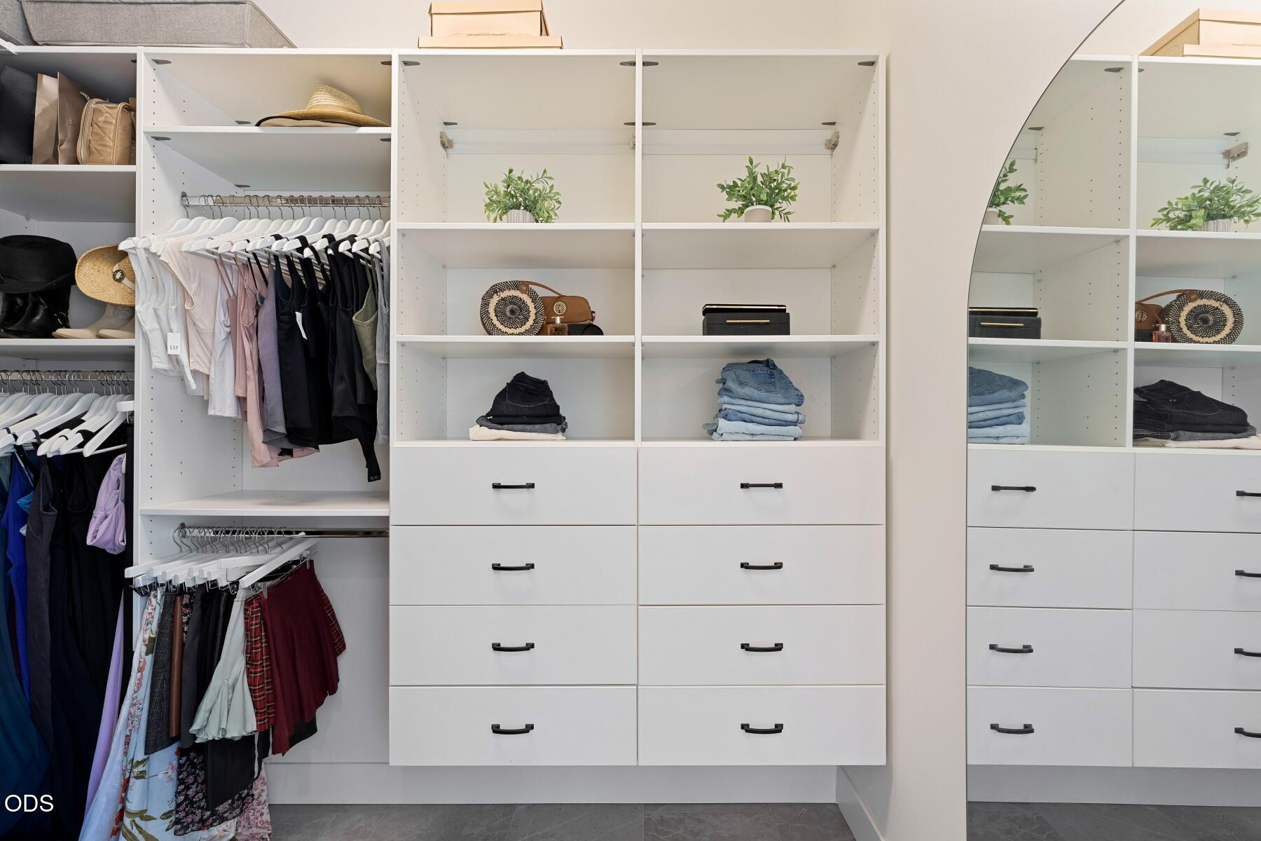 60255 Sunset View Drive Bend, OR 97702 - Photo 24 of 48 a view of walk in closet with clothes and shoes