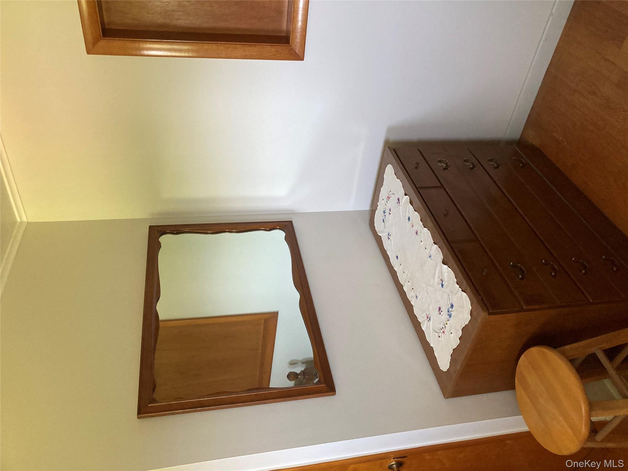 191 Rose Road Woodbourne, NY 12788 - Photo 19 of 32 a bathroom with a sink a toilet and mirror