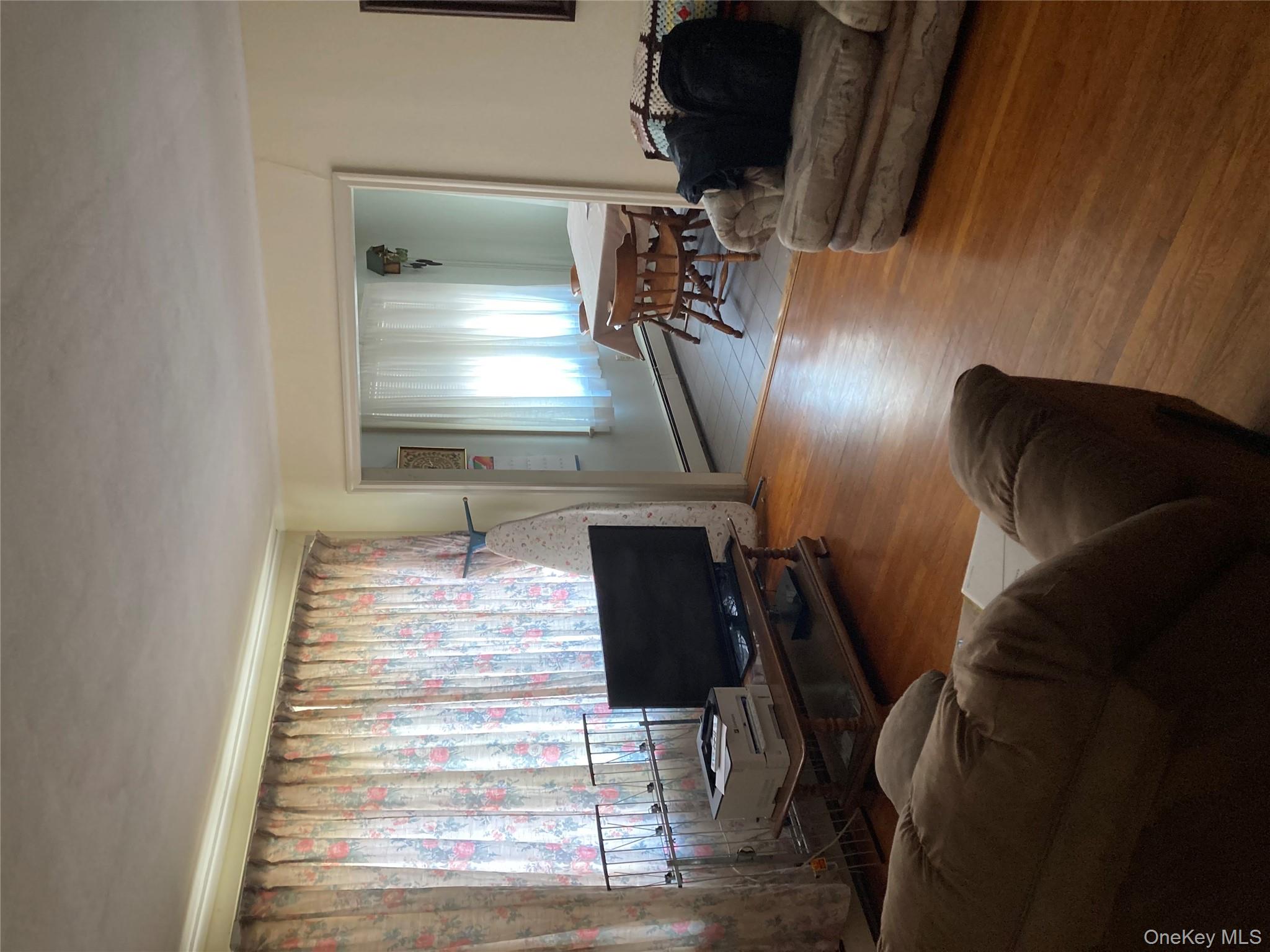 191 Rose Road Woodbourne, NY 12788 - Photo 23 of 32 a living room with furniture and a flat screen tv