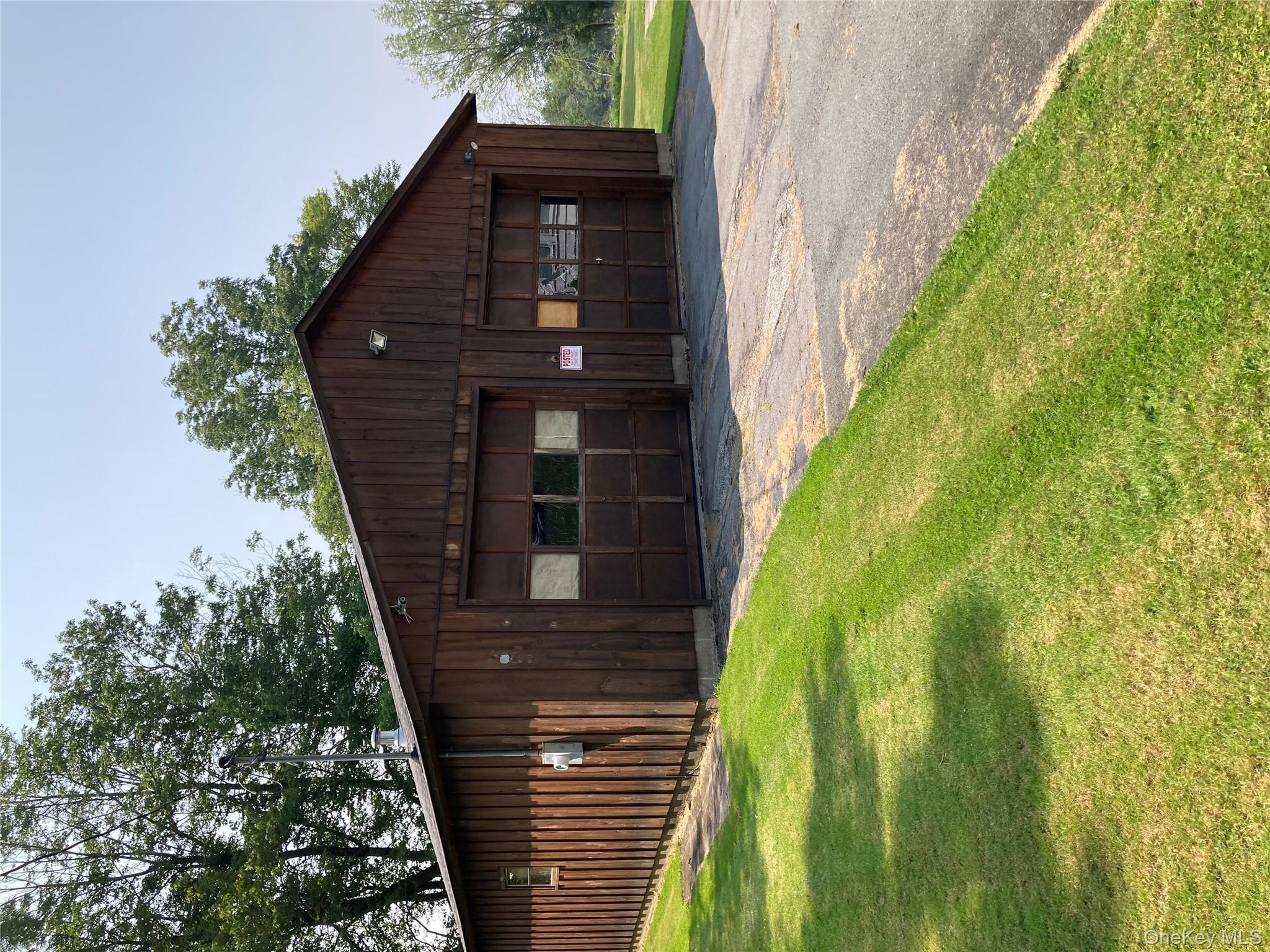 191 Rose Road Woodbourne, NY 12788 - Photo 26 of 32 a house with a yard