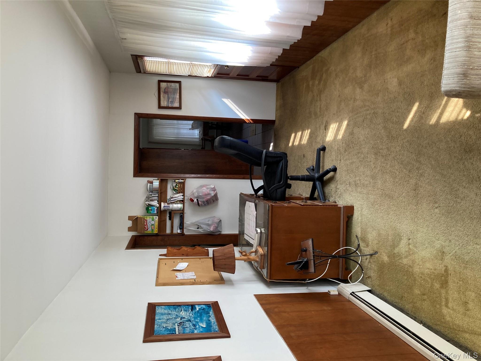 191 Rose Road Woodbourne, NY 12788 - Photo 32 of 32 a view of a workspace with furniture and a window