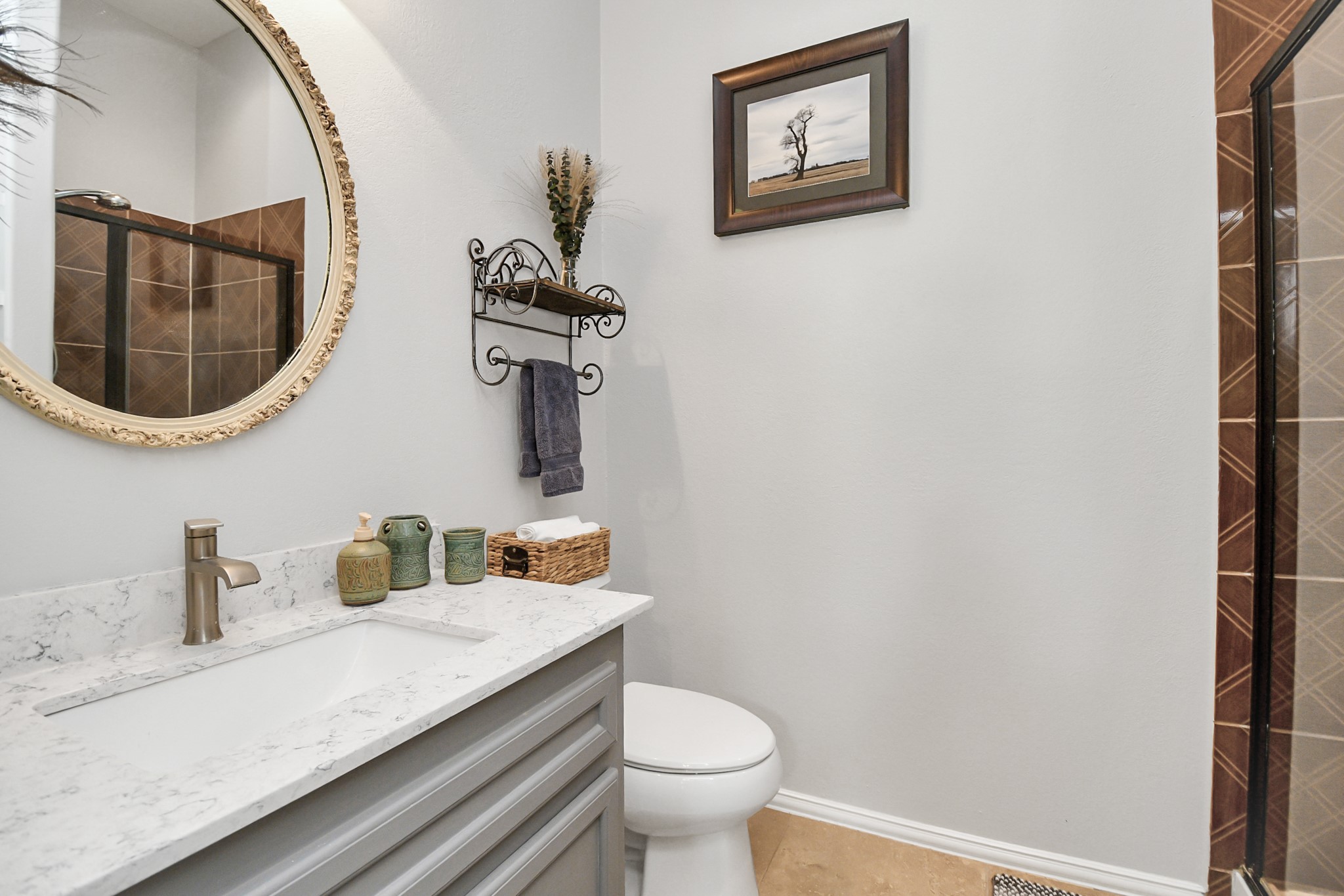5360 Muske Lane Pattison, TX 77423 - Photo 13 of 44 a bathroom with a toilet a sink and mirror