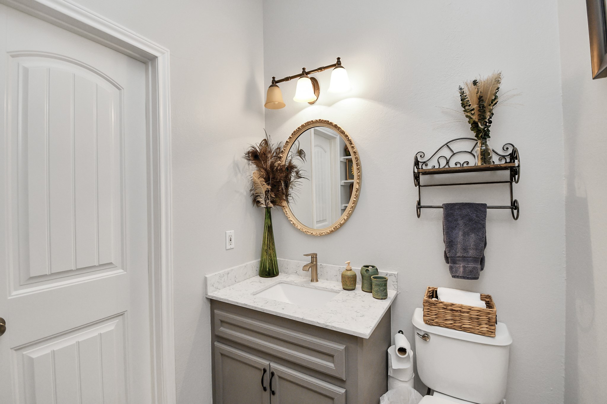 5360 Muske Lane Pattison, TX 77423 - Photo 14 of 44 a bathroom with a sink and a mirror