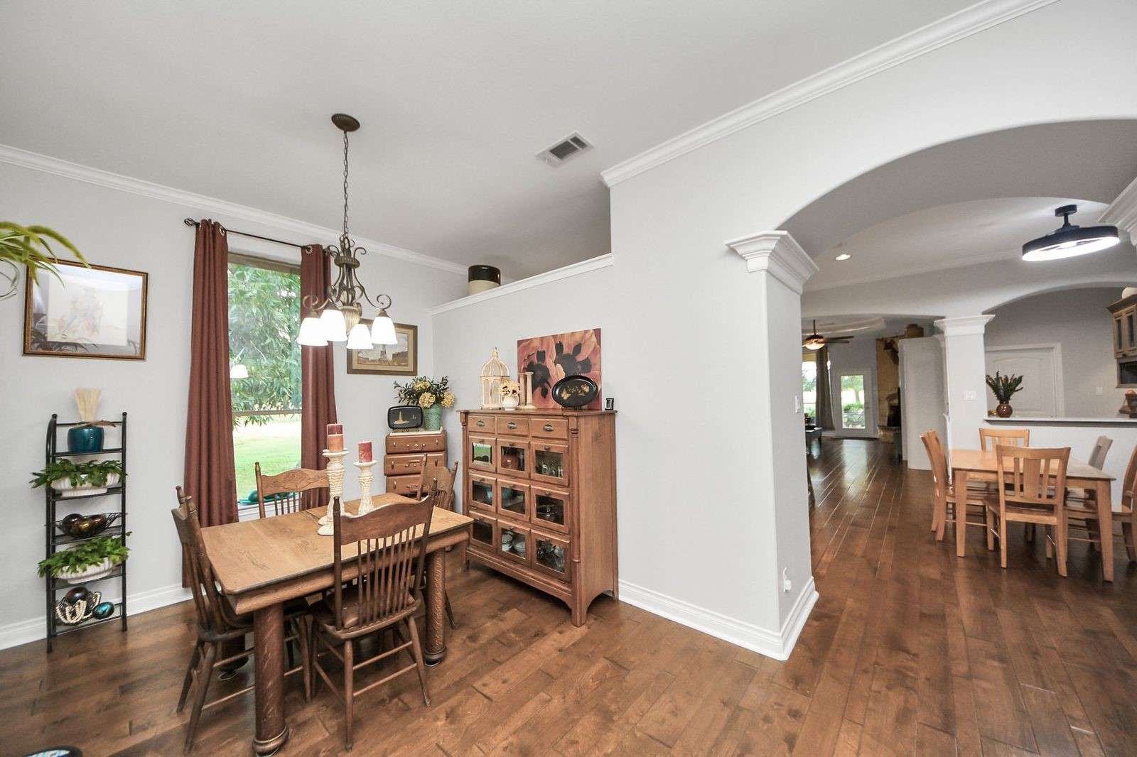 5360 Muske Lane Pattison, TX 77423 - Photo 15 of 44 a view of a livingroom with furniture and wooden floor