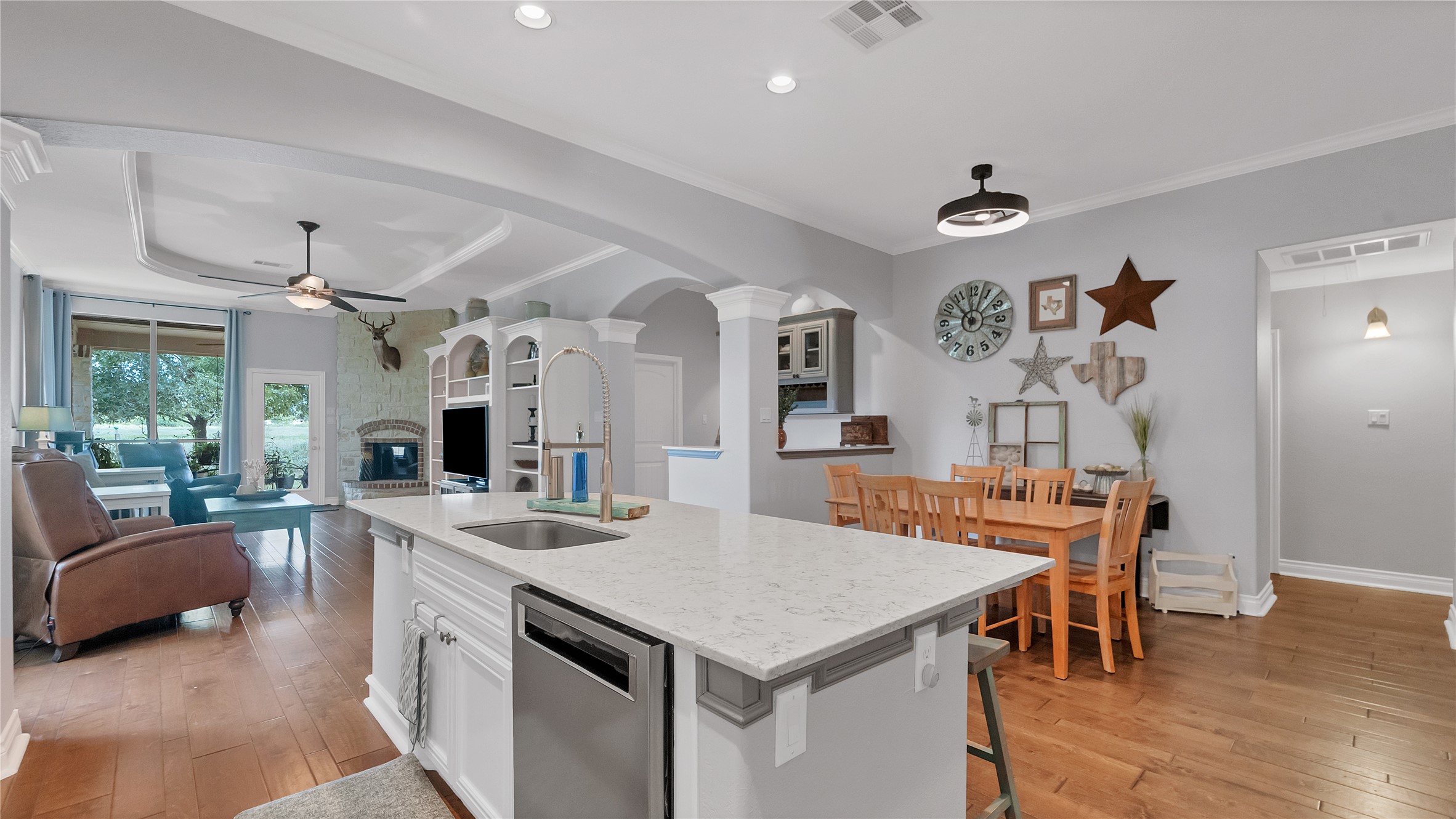 5360 Muske Lane Pattison, TX 77423 - Photo 20 of 44 a view of a dining room with furniture and wooden floor