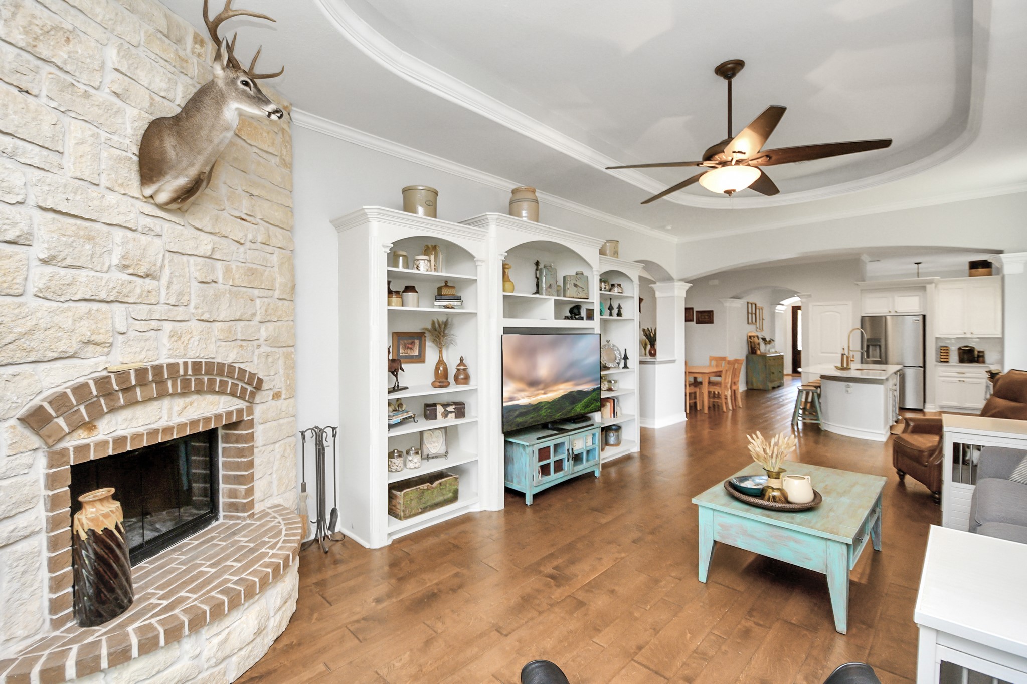 5360 Muske Lane Pattison, TX 77423 - Photo 22 of 44 a living room with furniture and a fireplace