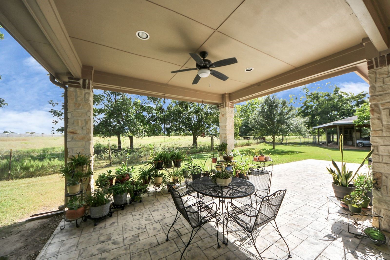 5360 Muske Lane Pattison, TX 77423 - Photo 41 of 44 a view of a porch with furniture and a yard