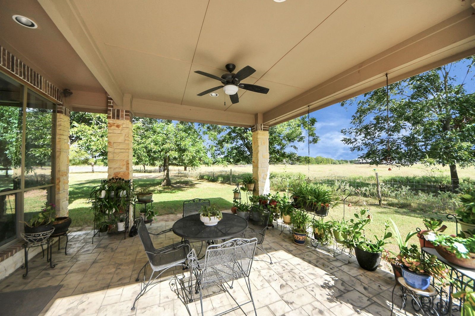 5360 Muske Lane Pattison, TX 77423 - Photo 42 of 44 a very nice looking room with a large window with outdoor seating