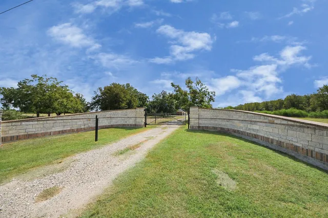a view of swimming pool with a yard