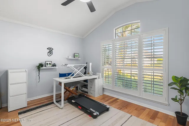 a workspace with furniture and a window