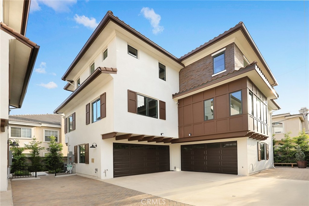 905 Sunset Boulevard, Unit A Arcadia, CA 91007 - Photo 4 of 35 a front view of a house with a garage