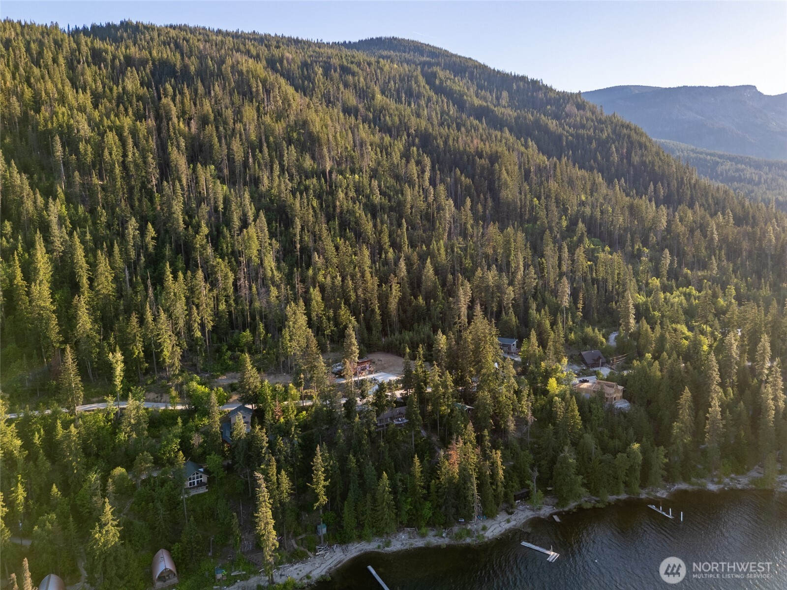 16063 Cedar Brae Road Leavenworth, WA 98826 - Photo 4 of 19 a view of a city with lush green forest