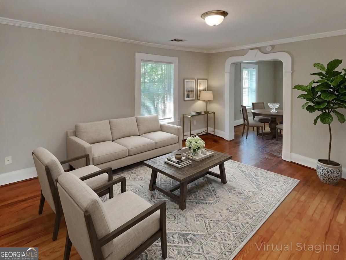 1337 South Hairston Road Stone Mountain, GA 30088 - Photo 4 of 17 a living room with furniture and wooden floor