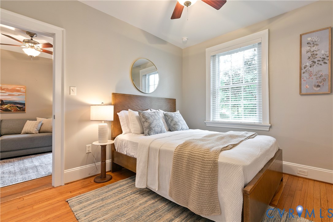 601 Roseneath Road, Unit U1 Richmond, VA 23221 - Photo 28 of 36 Bedroom featuring wood-finish flooring, a window w