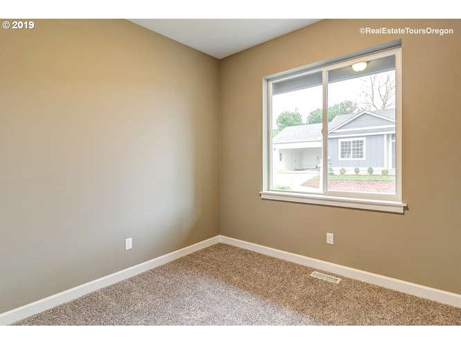 1060 6th Street Gervais, OR 97026 - Photo 27 of 30 an empty room with windows