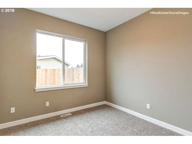1060 6th Street Gervais, OR 97026 - Photo 29 of 30 an empty room with a window