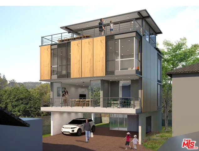 a view of a swimming pool with a table and chairs