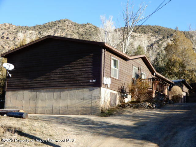 a view of a house with a street